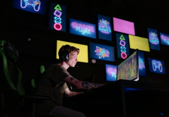 a man playing a video game in a computer
